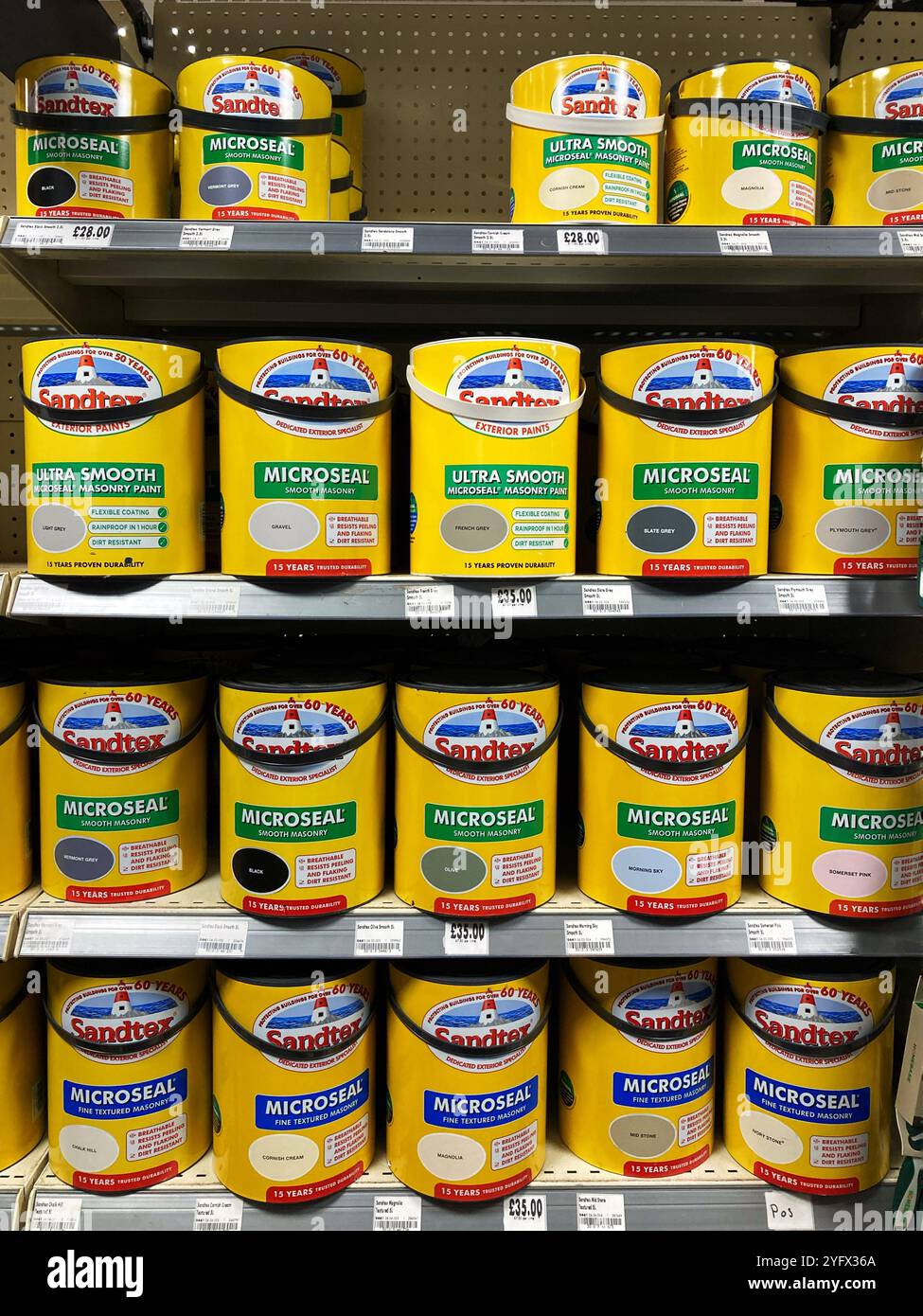 Choice of Sandtex exterior masonry paint in different colours at the local DIY store - Smartphone Captured Stock Image