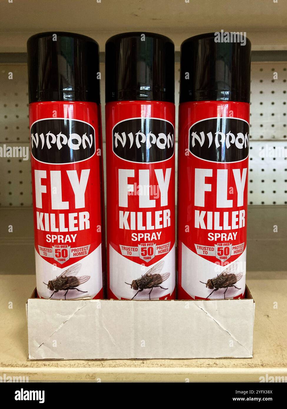 Fly Spray on the shelves for sale at the local DIY store - Smartphone Captured Stock Image