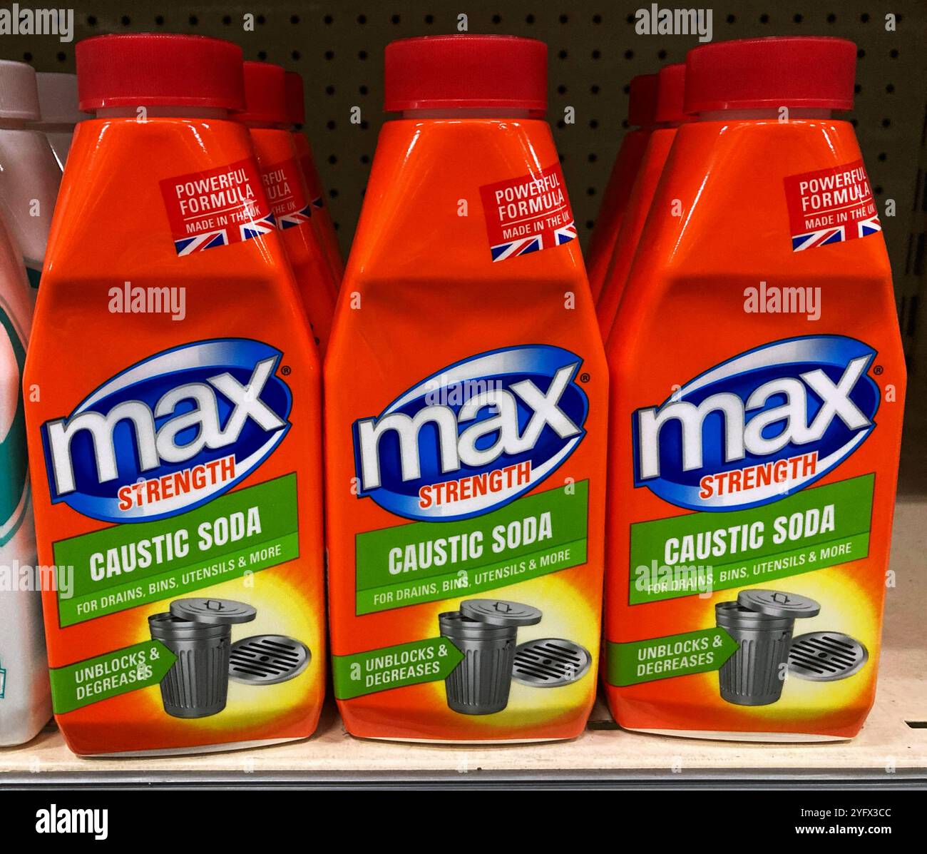 Bottles of Max Strength Caustic Soda for sale at the local DIY store - Smartphone Captured Stock Image