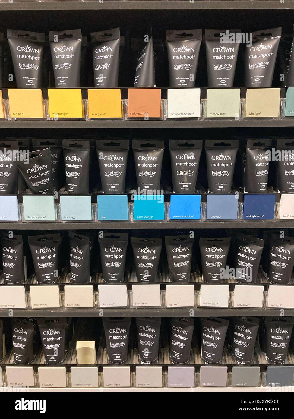 Choice of Crown Matchpot testers at local DIY store - Smartphone Captured Stock Image