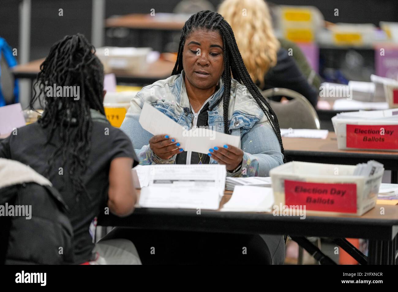 Election workers process ballots for the 2024 General Election, Tuesday