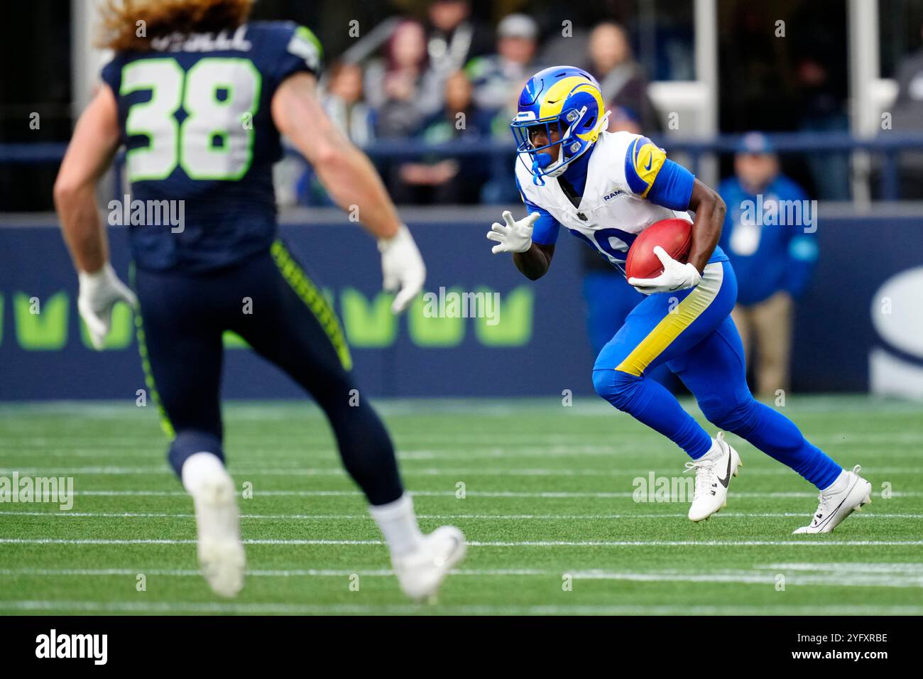 Los Angeles Rams wide receiver Xavier Smith (19) runs with the ball ...
