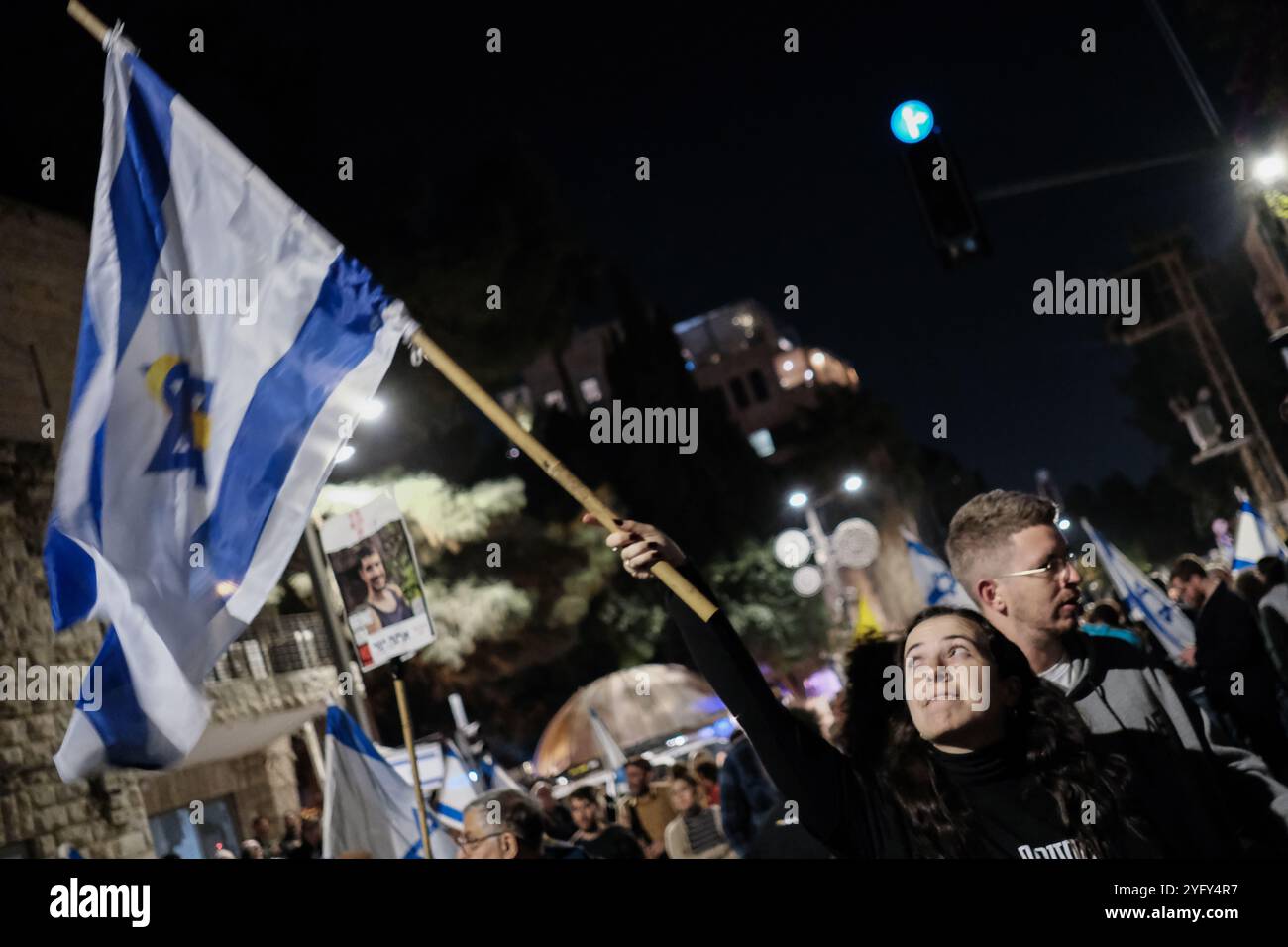 Jerusalem, Israel. 5th November, 2024. Thousands gather at the Prime Minister's residence in Jerusalem, simultaneously with similar gatherings nationwide, to protest Netanyahu's firing Defense Minister Gallant and assigning a security wise inexperienced Foreign Minister Katz in the Defense Ministry. Gallant states differences with the PM on the ultra Orthodox draft, the concessions necessary to release all hostages from Hamas captivity and the necessity to establish a state investigation committee for the failures of the 7th October massacre. Many hold Netanyahu personally accountable for all Stock Photo