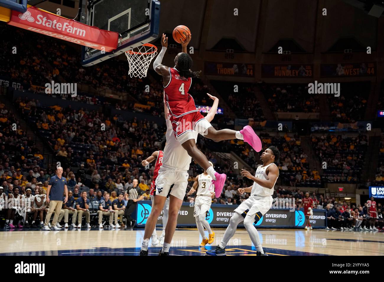 Morgantown, West Virginia, USA. 4th Nov, 2024. November 4, 2024: Josh Omojafo #4 and Tucker DeVries #12 during the West Virginia University Mountaineers vs. Robert Morris University Colonials at the WVU Coliseum in Morgantown WV. Brook Ward/Apparent Media Group (Credit Image: © AMG/AMG via ZUMA Press Wire) EDITORIAL USAGE ONLY! Not for Commercial USAGE! Stock Photo