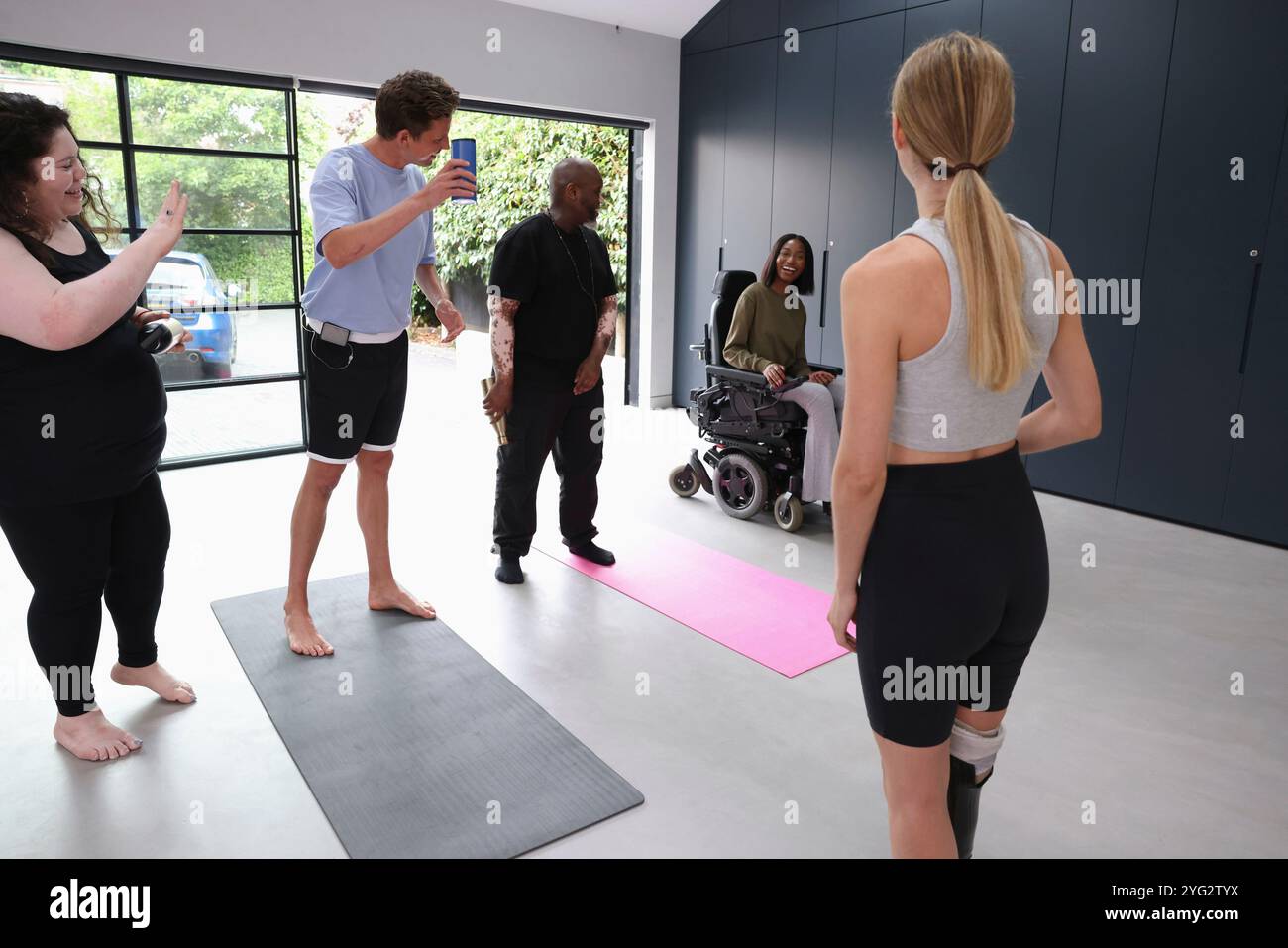 Woman in wheelchair talking on hi-res stock photography and images - Alamy