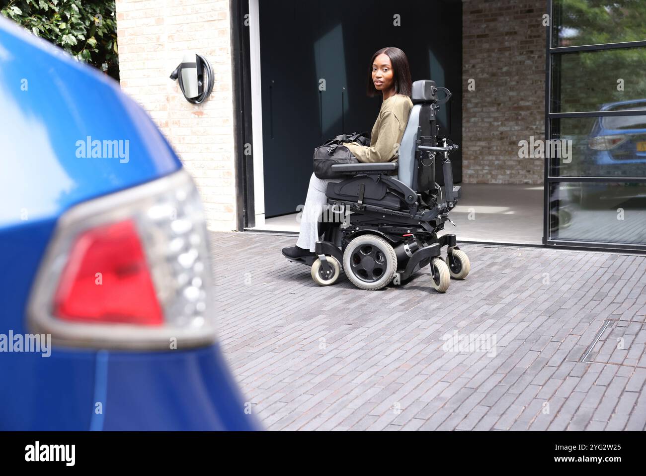 Black woman in wheelchair hi-res stock photography and images - Alamy