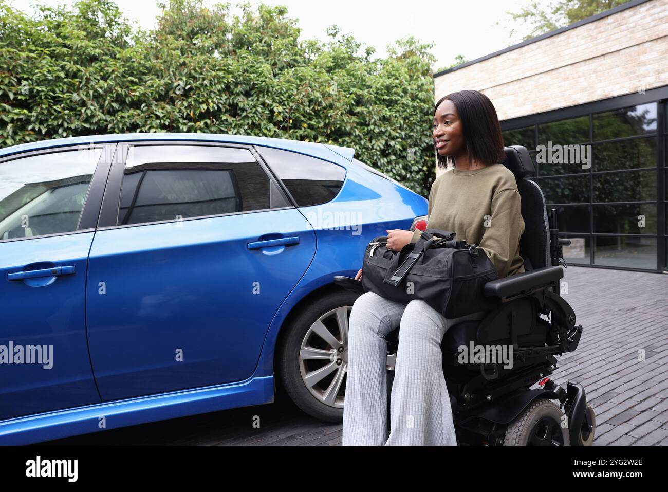 Black woman in wheelchair hi-res stock photography and images - Alamy