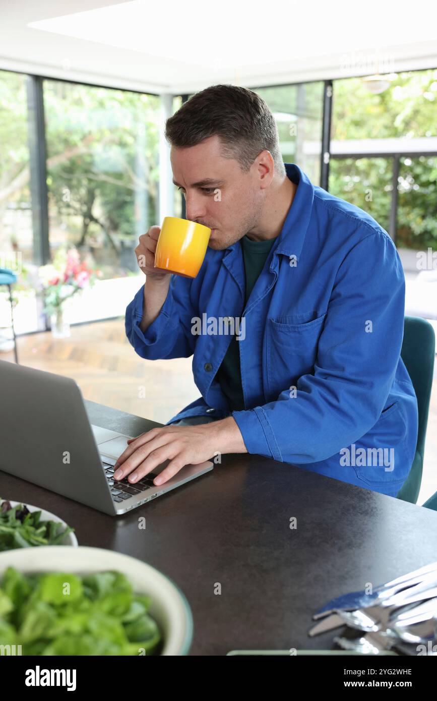 Man working on laptop Stock Photo