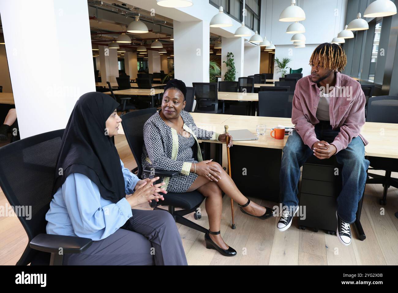 Four multiracial business people in hi-res stock photography and images ...
