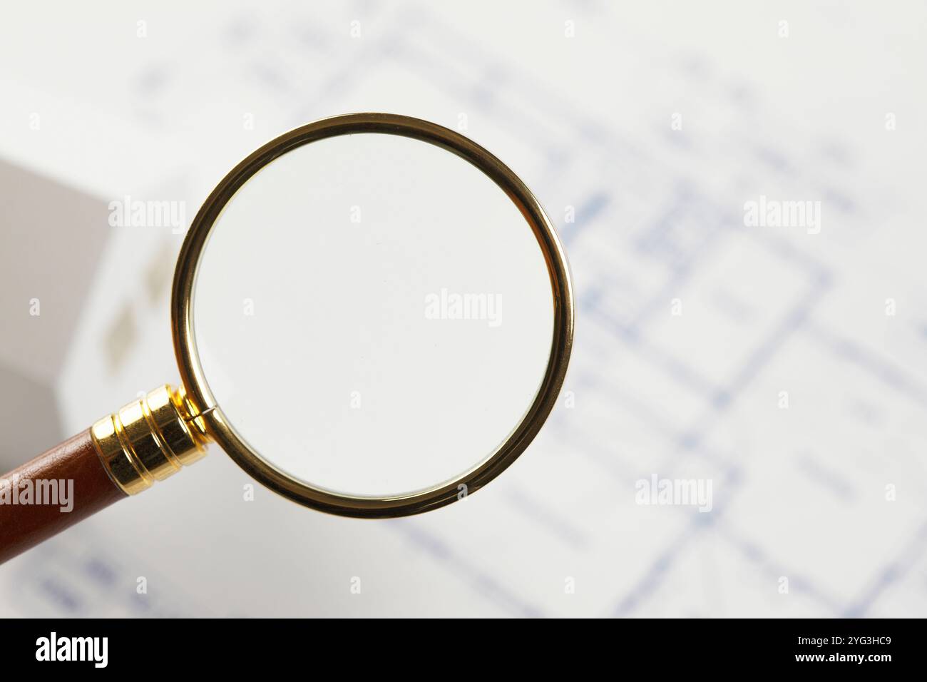 Loupe and blueprints Stock Photo - Alamy