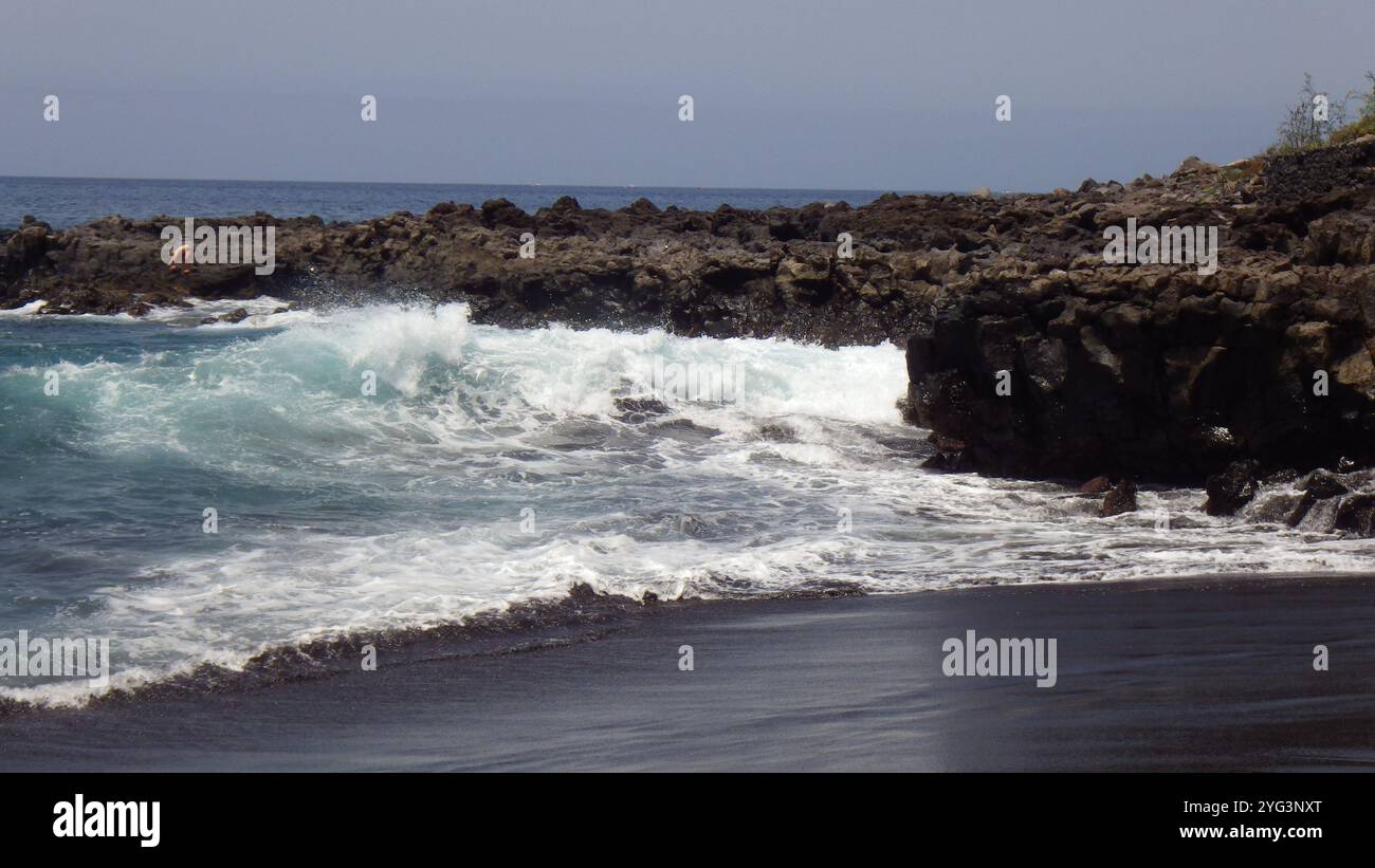 Dramatic Waves Crashing on Rocky Black Sand Beach Stock Photo - Alamy