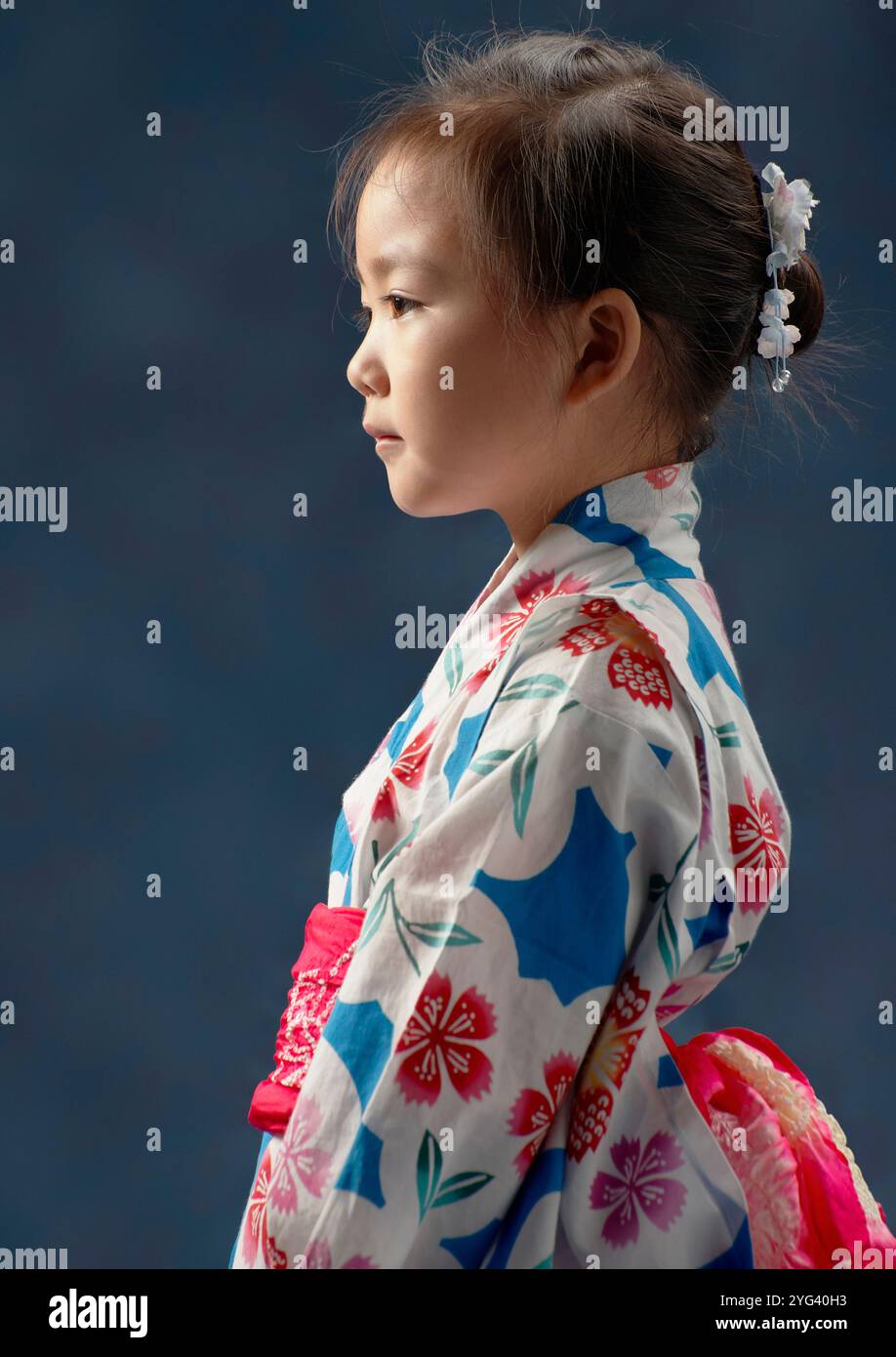 Half-length portrait of a girl in a yukata, sideways portrait Stock Photo