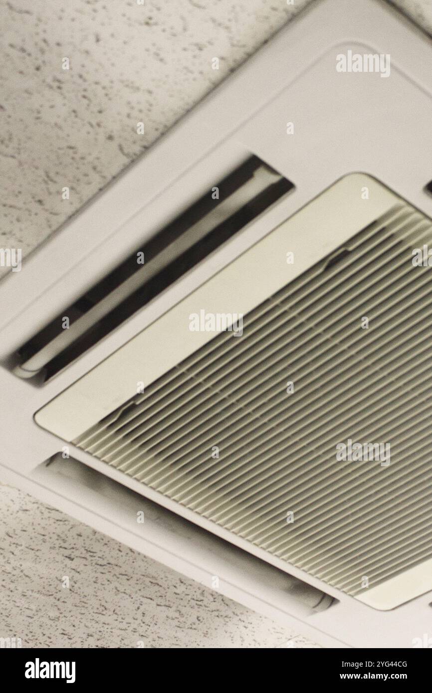 Dirty built-in air conditioner in ceiling Stock Photo