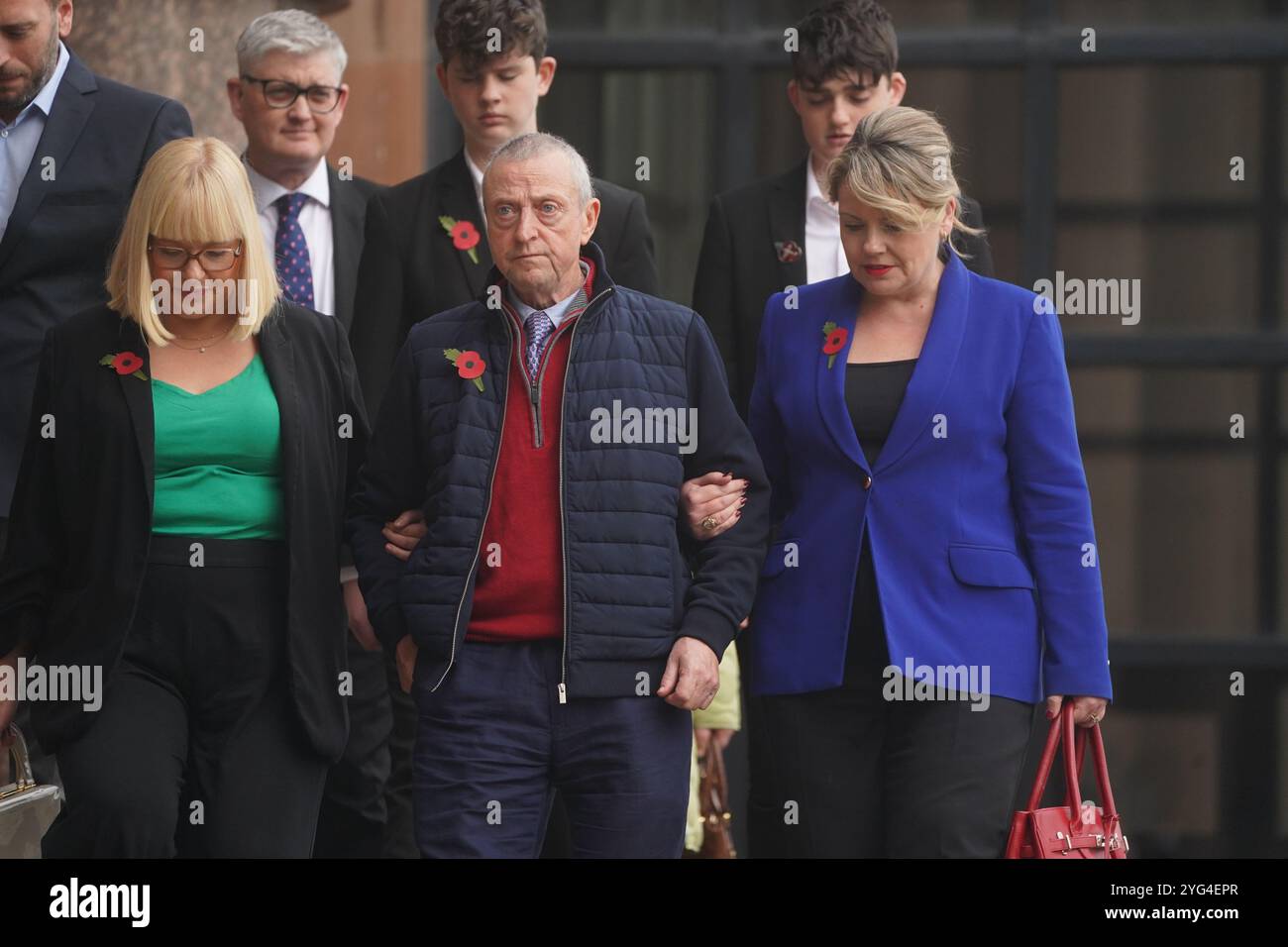 Patrick O'Hara (centre) and family members leave Newcastle Crown Court, in Newcastle, where Sunderland-based GP Dr Thomas Kwan, was sentenced to 31 years and five months after he attempted to murder Mr O'Hara, who was his mother's partner, with a poisoned fake Covid jab whilst disguised as a nurse. Picture date: Wednesday November 6, 2024. Stock Photo