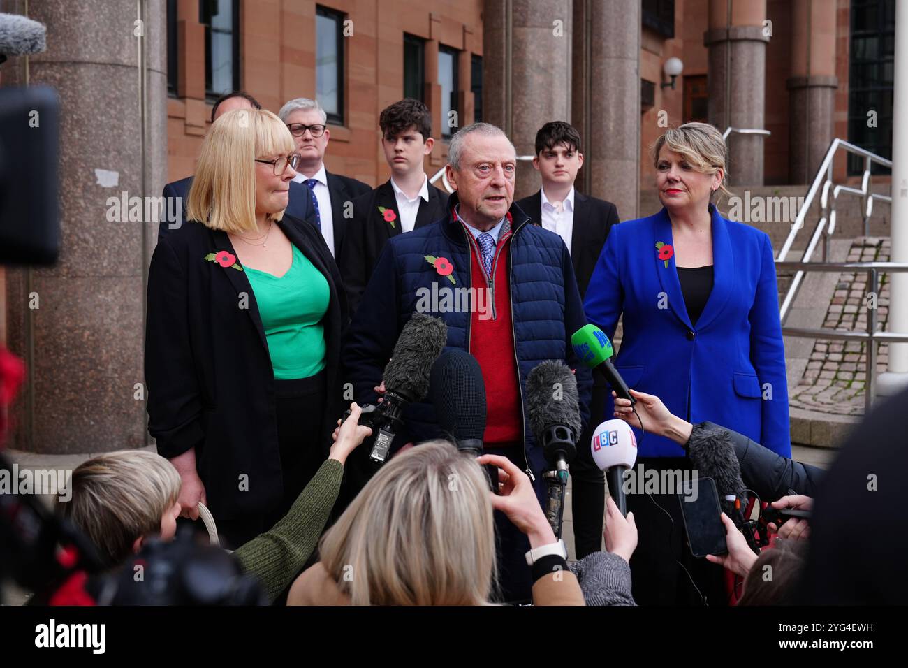 Patrick O'Hara (centre) stands with family members as he speaks to the media outside Newcastle Crown Court, in Newcastle, where Sunderland-based GP Dr Thomas Kwan, was sentenced to 31 years and five months after he attempted to murder Mr O'Hara, who was his mother's partner, with a poisoned fake Covid jab whilst disguised as a nurse. Picture date: Wednesday November 6, 2024. Stock Photo