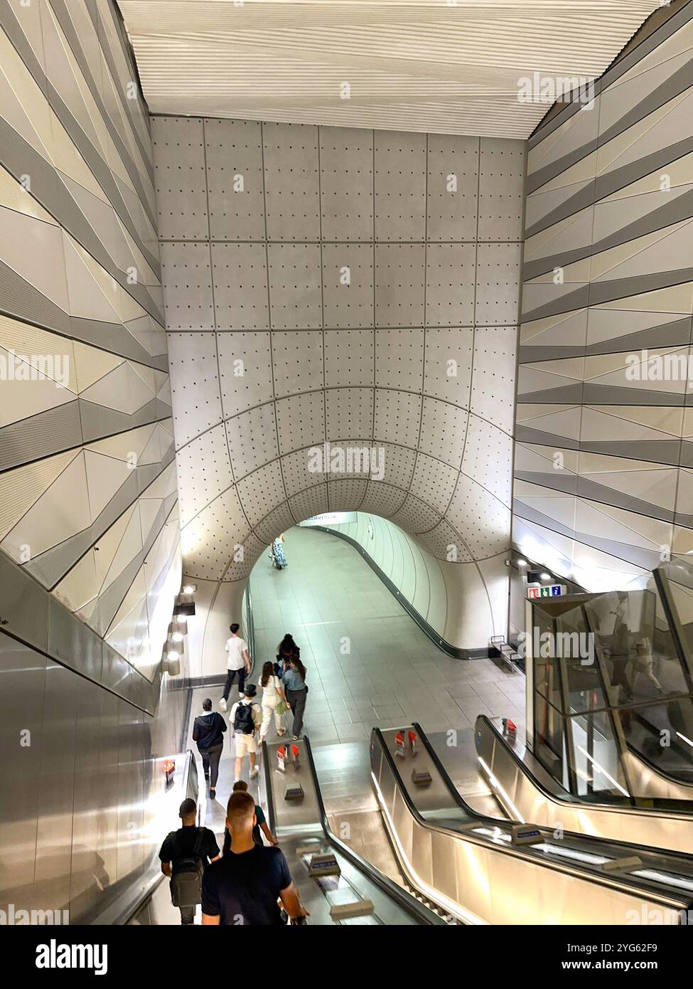 London, England, UK - 24 August 2023: People entering one of the modern railway stations on the Elizabeth Line - Smartphone Captured Stock Image