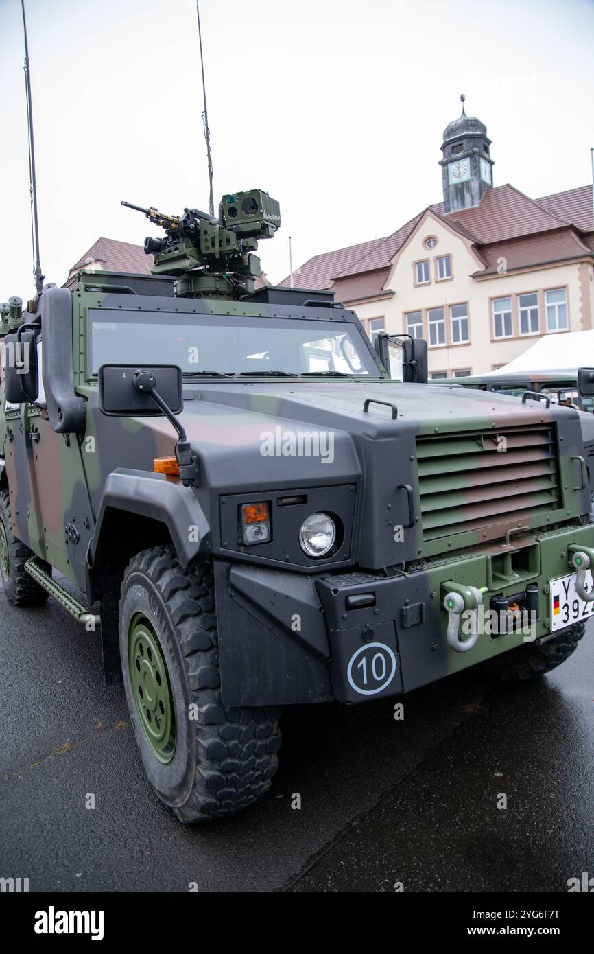 06 November 2024, Bavaria, Würzburg: A Bundeswehr vehicle with weapons ...