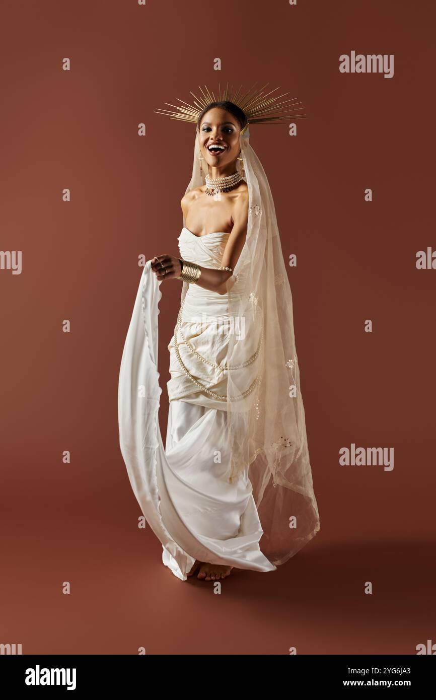 Woman gracefully poses adorned hi-res stock photography and images - Alamy