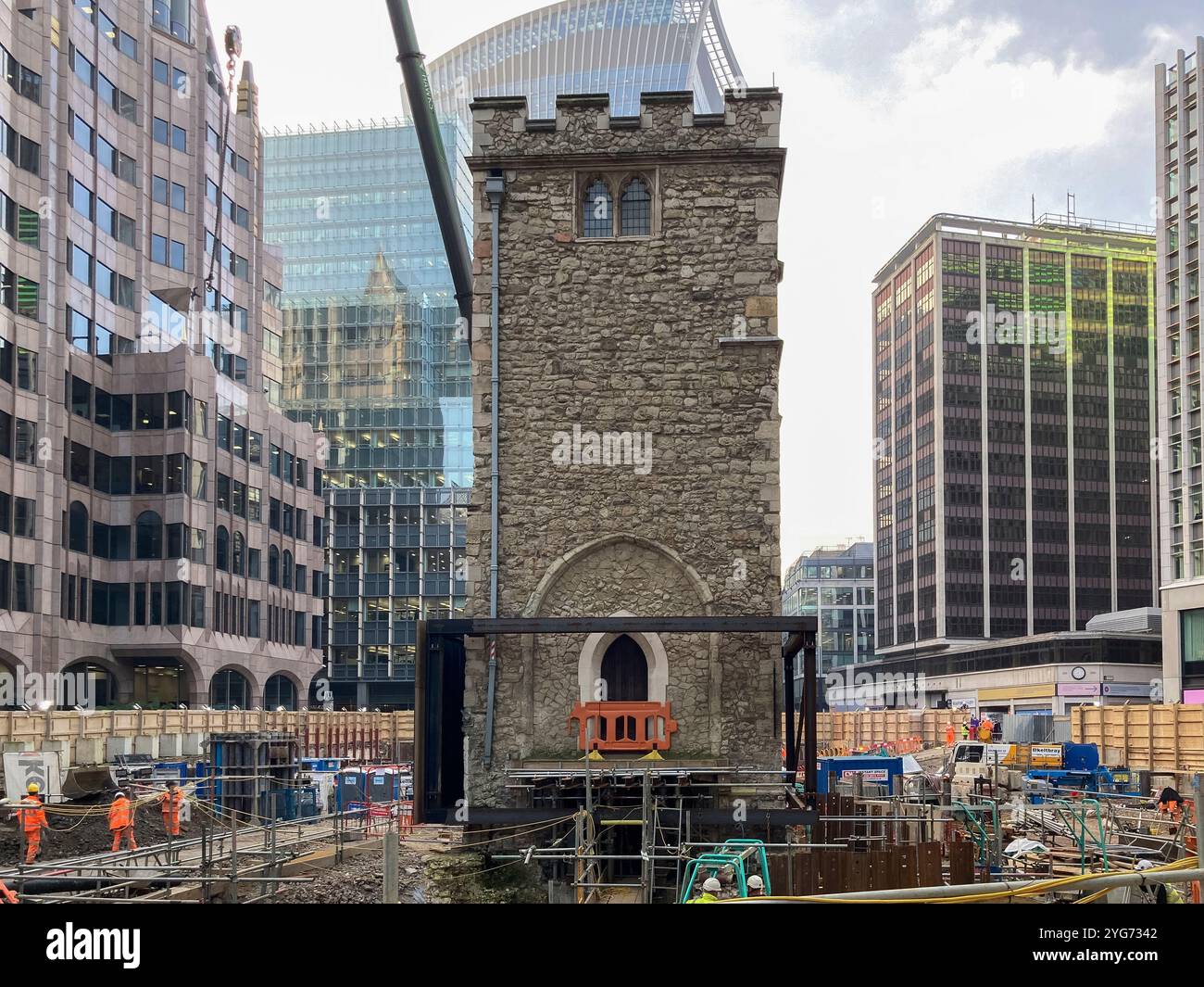 Historic Grade I listed All Hallows Staining church tower surrounded by excavation works during redevelopment of the area. City of London, UK - Smartphone Captured Stock Image