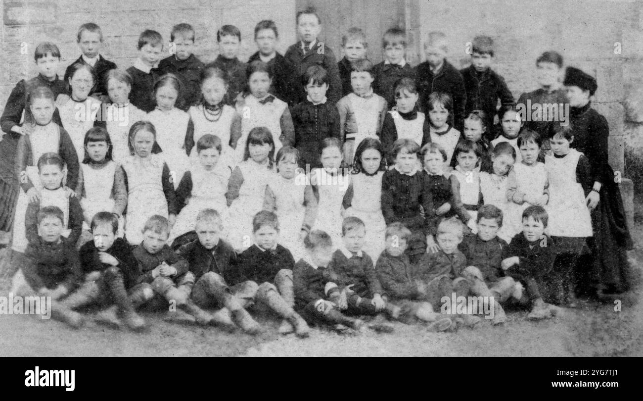 A British class photo in the 19th Century. Stock Photo