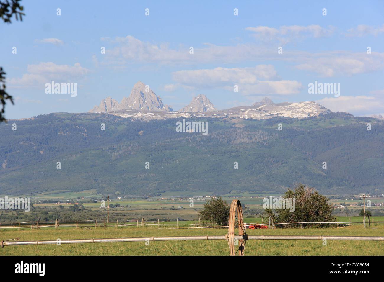 Summer view of Teton Mountain Range from Idaho farm Stock Photo