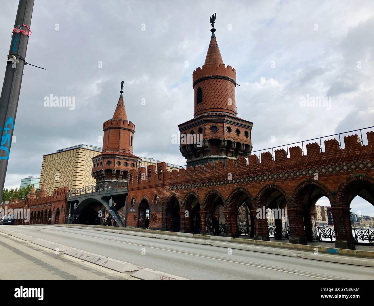 Oberbaumbrücke (Oberbaum Bridge) which crosses the River Spree. Friedrichshain-Kreuzberg, Berlin, Germany. 4th October 2023. - Smartphone Captured Stock Image