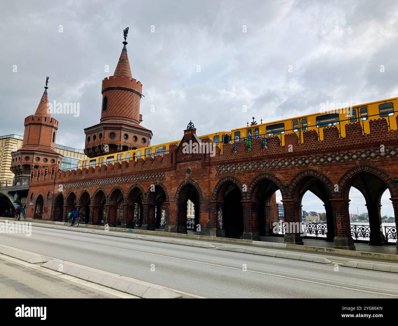 Oberbaumbrücke (Oberbaum Bridge) which crosses the River Spree. Friedrichshain-Kreuzberg, Berlin, Germany. 4th October 2023. - Smartphone Captured Stock Image