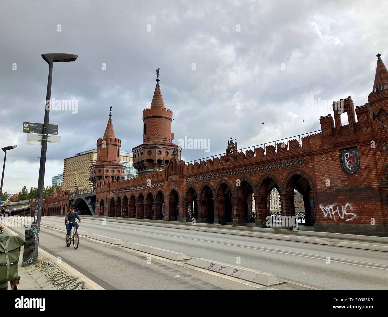 Oberbaumbrücke (Oberbaum Bridge) which crosses the River Spree. Friedrichshain-Kreuzberg, Berlin, Germany. 4th October 2023. - Smartphone Captured Stock Image