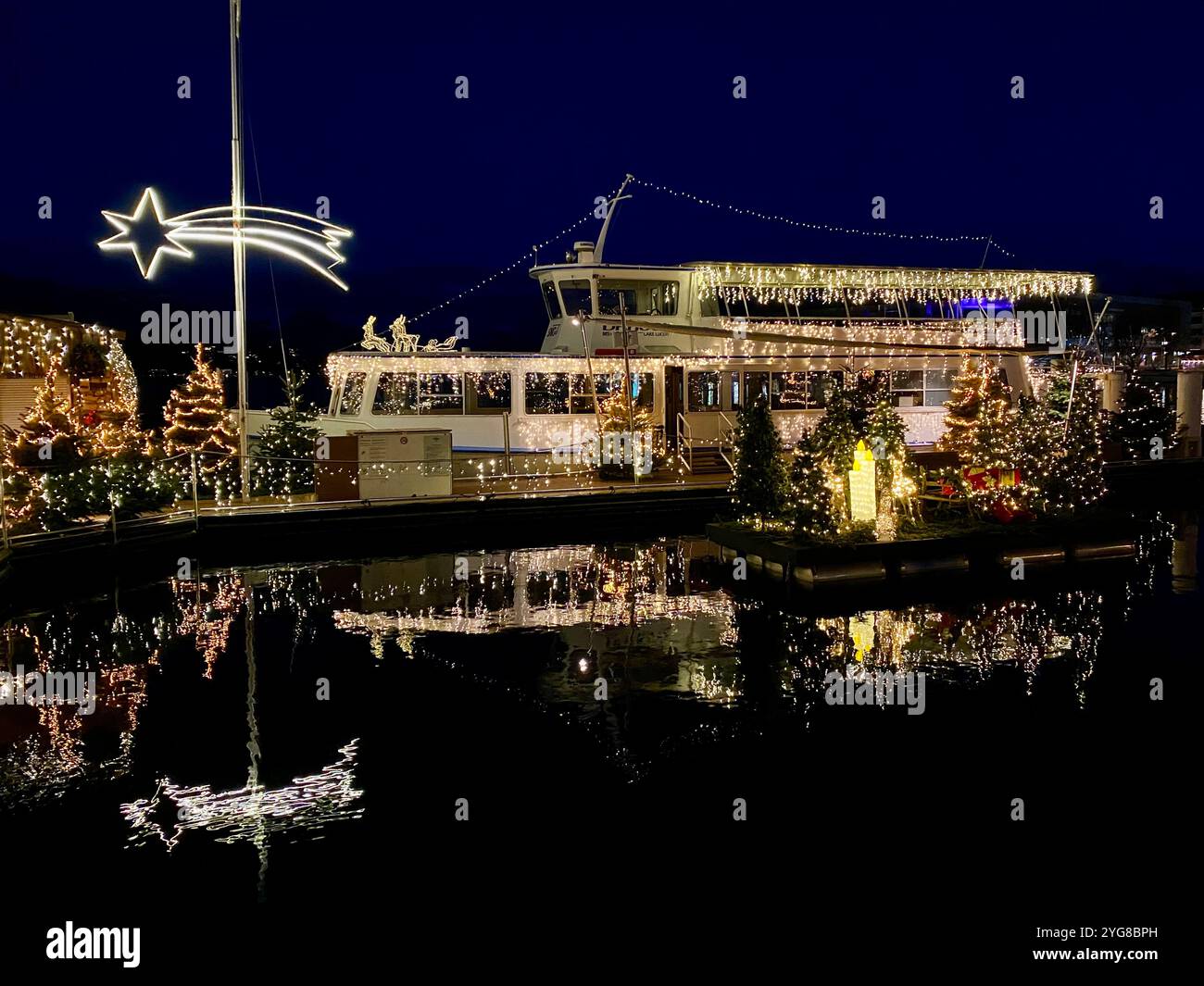 Decorated Festive Boat Illuminated by Christmas Lights at Night - Smartphone Captured Stock Image