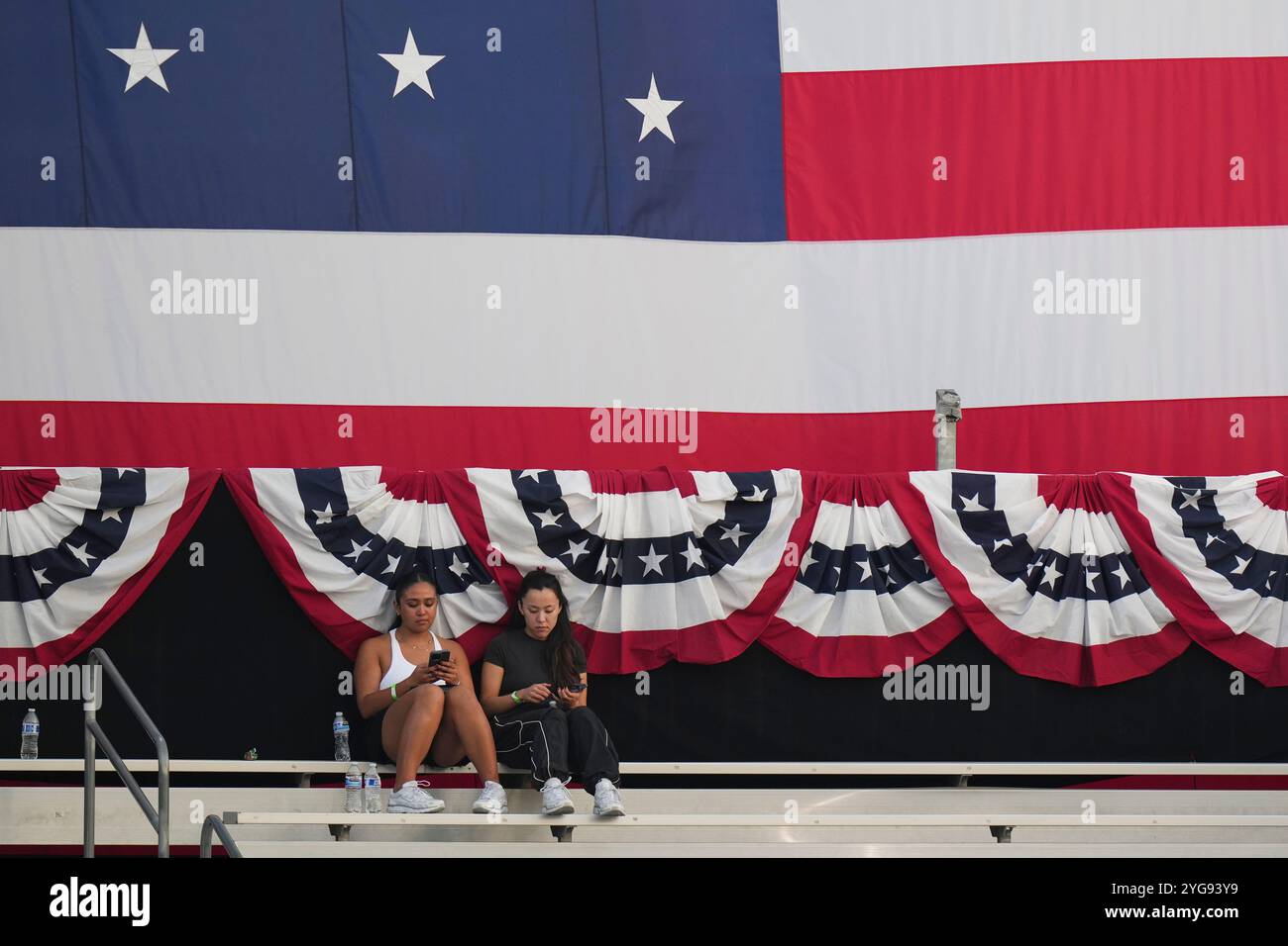 Supporters of Vice President Kamala Harris react after she delivered a