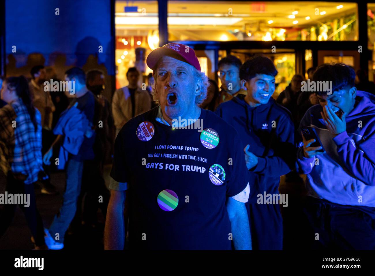 New York, United States. 05th Nov, 2024. NEW YORK, NEW YORK - NOVEMBER 5: Onlookers watch as the 2024 U.S. Presidential election results are broadcast outside Rockefeller Center on November 5, 2024 in New York City. Donald Trump was elected the 47th president of the United States, pulling off a stunning political comeback in one of the most polarized contests for the White House in US history.? (Photo by Michael Nigro/Sipa USA) Credit: Sipa USA/Alamy Live News Stock Photo