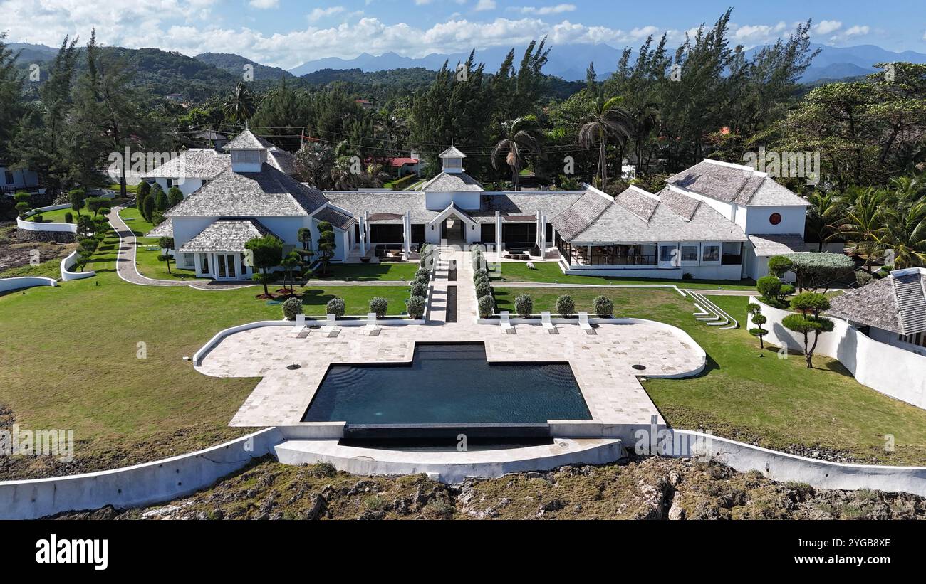 Aerial shots of the renowned Trident Hotel capture its stunning architecture nestled along the Caribbean coast Stock Photo