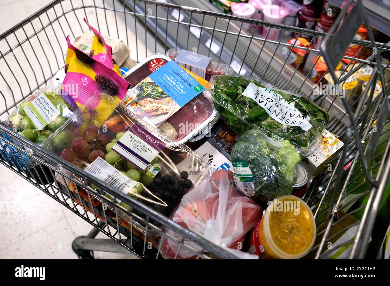 waitrose supermarket chain store showing trolley with bought food Stock Photo