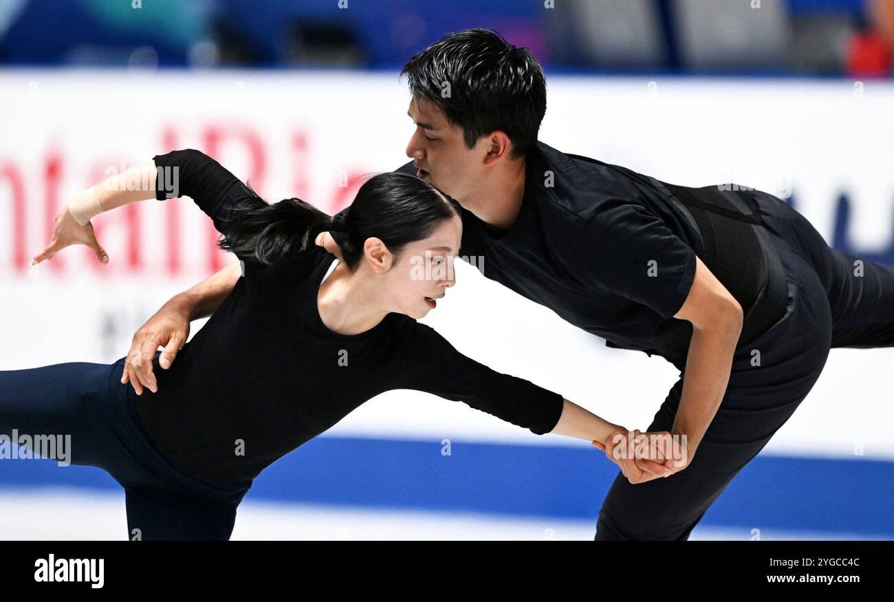 Japan's Riku Miura (left), Ryuichi Kihara practices for the ISU Grand
