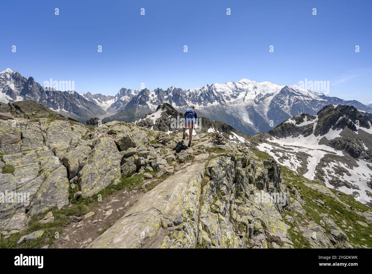 Mountaineer on hiking trail, mountain landscape with mountain peak Mont ...