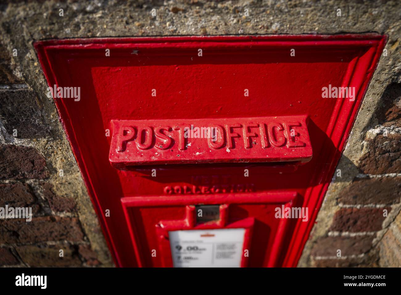 Close-up of a red Post Office letterbox with recognisable lettering, Kew, London, England, Great Britain Stock Photo