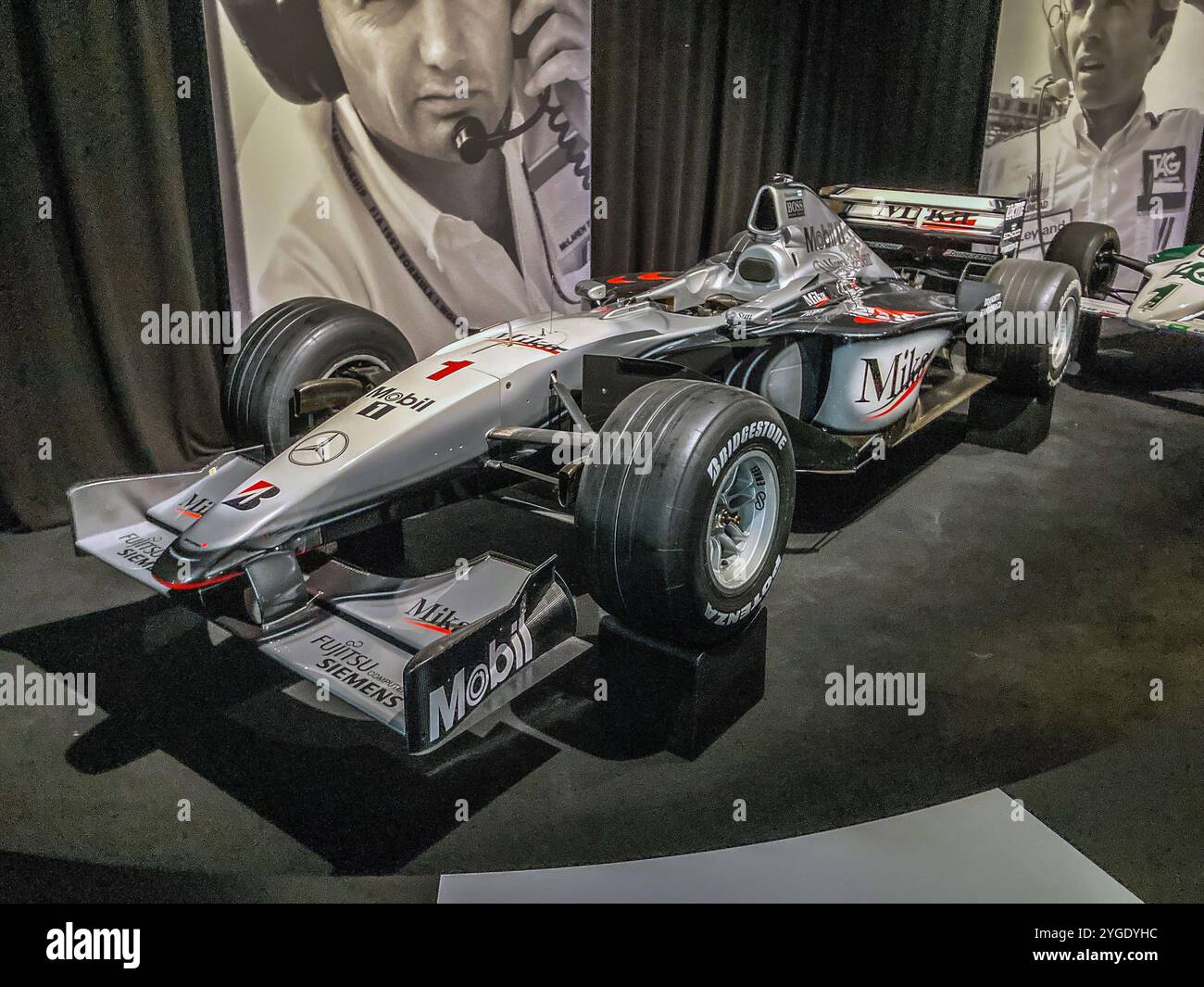 The McLaren MP4/14, in which Mika Häkkinen won the Formula One, 1999  Drivers World Championship, on display at the Formula One Exhibition, ExCel, - Smartphone Captured Stock Image