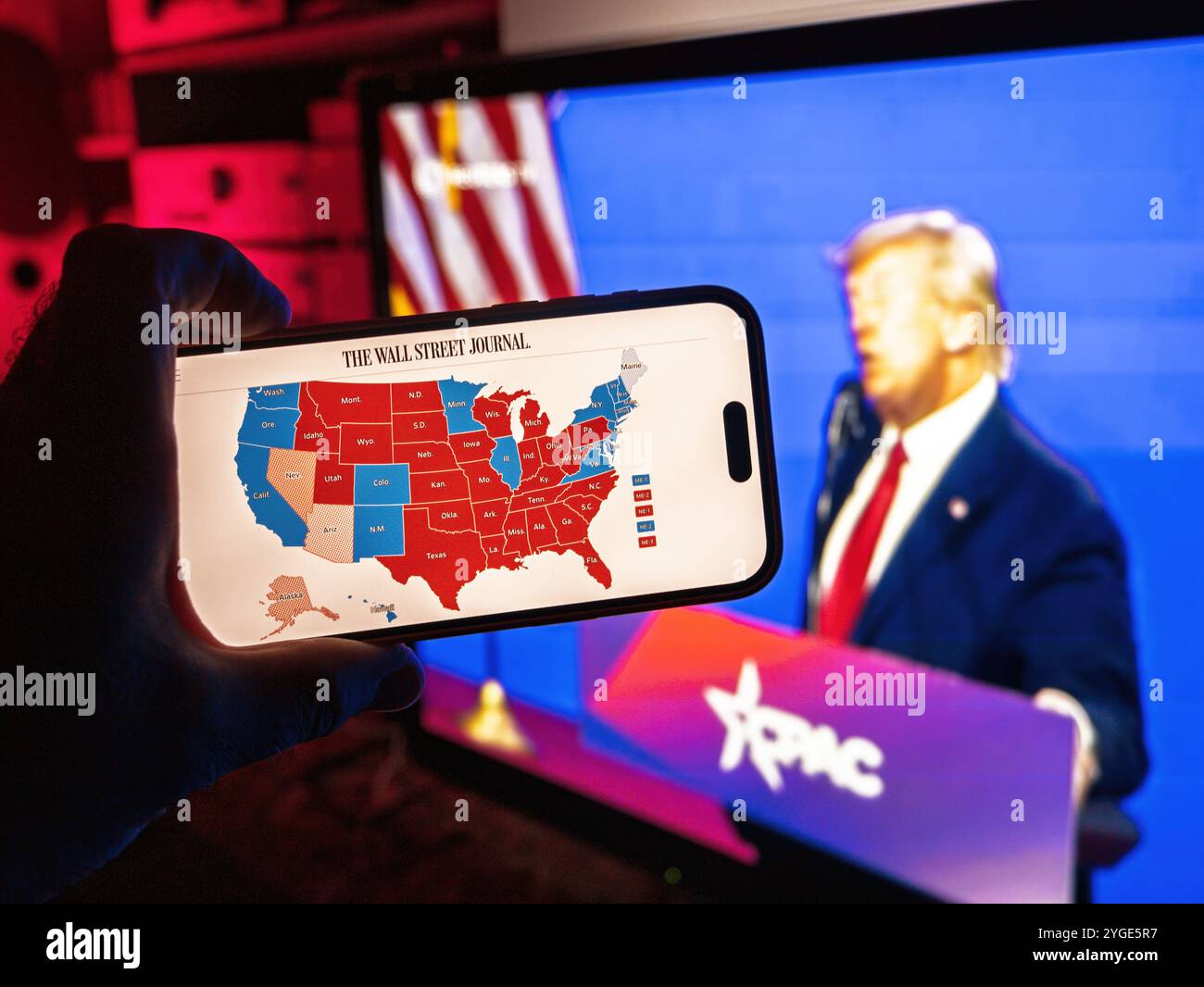 Paris, France Nov 6, 2025 Person holding a phone displaying The Wall