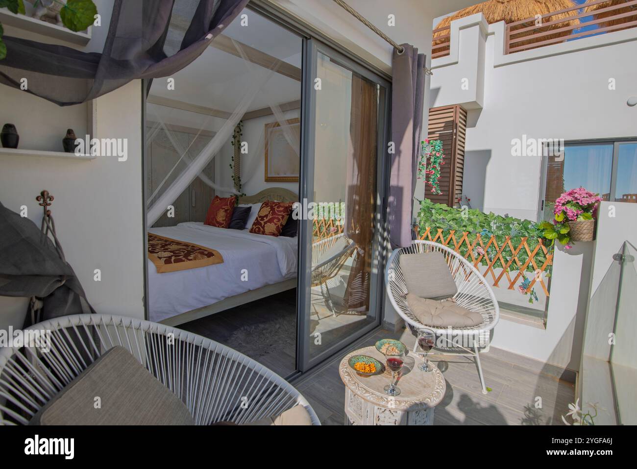 Terrace balcony furniture of a luxury apartment in tropical resort with ... - Luxury Apartment Framed Sliding Fernadas