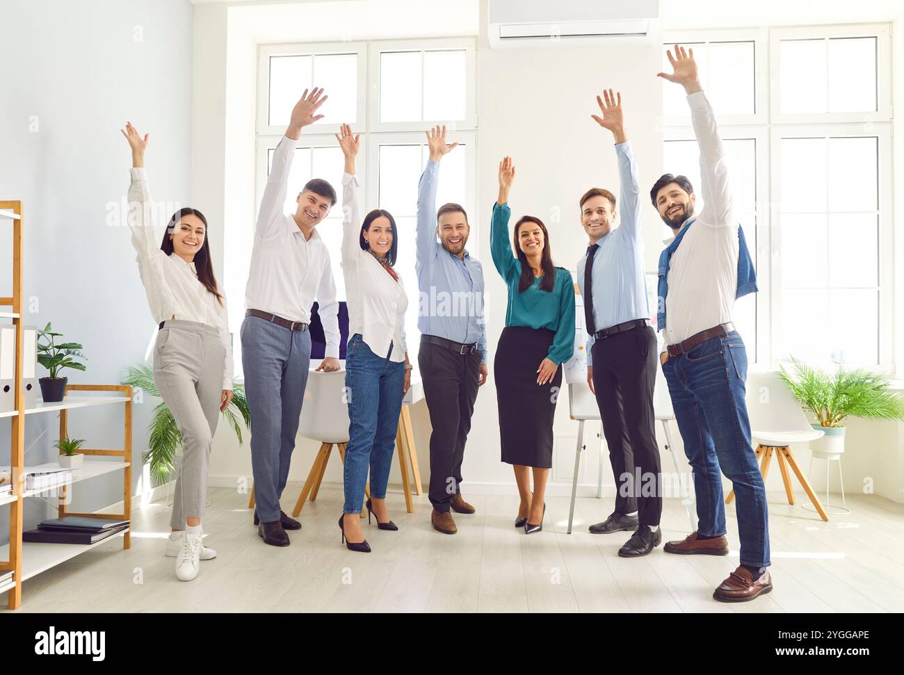 Business celebrating happy team hi-res stock photography and images - Alamy