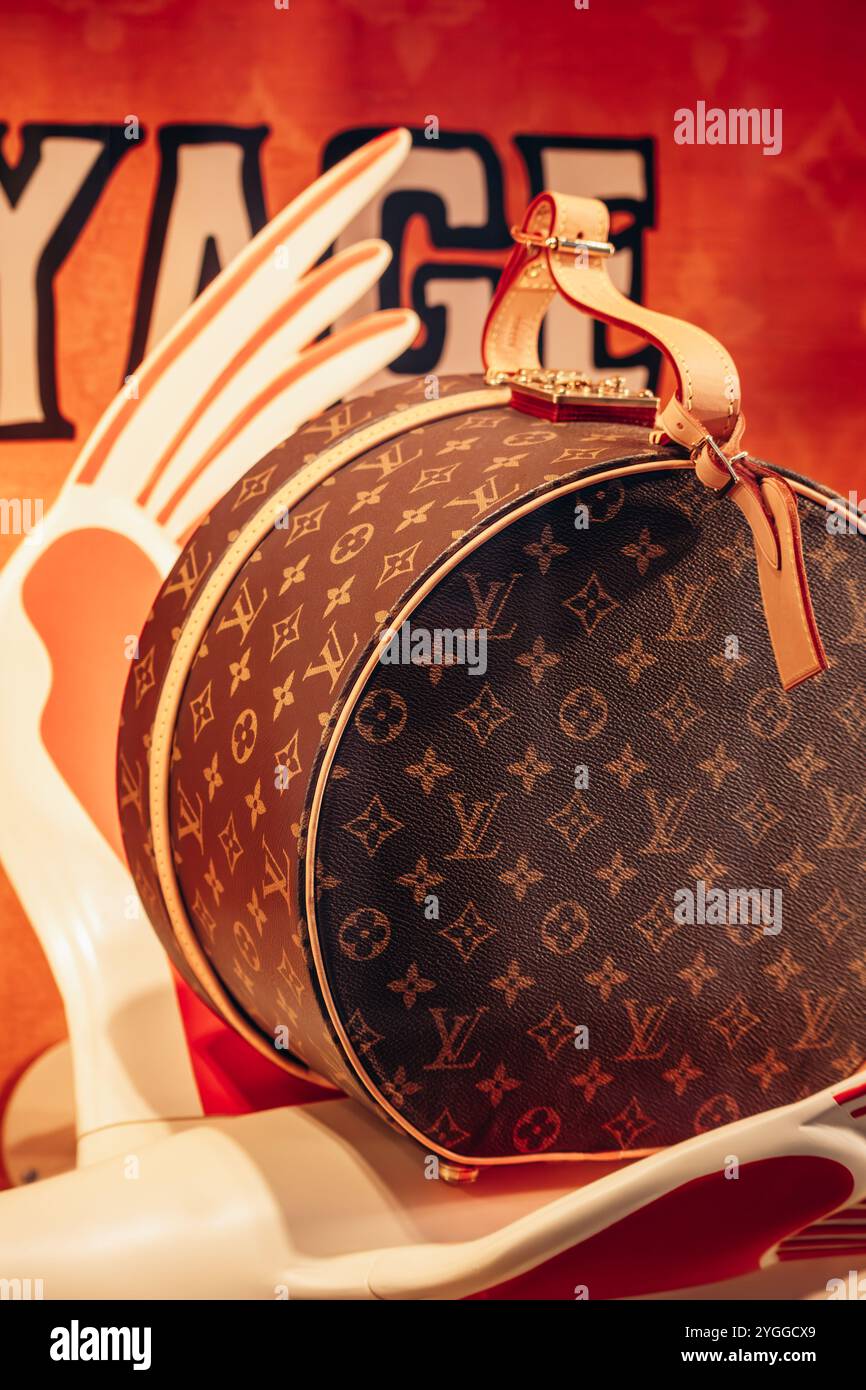 Louis vuitton round suitcase hotsell