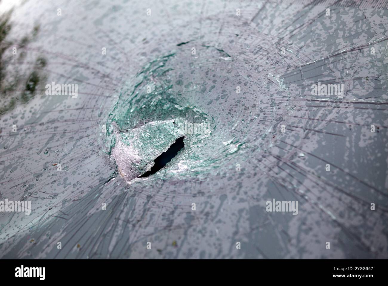 A stone impact shattered a car's windscreen after travelling several metres at 106mph during Storm Ciaran. Stock Photo