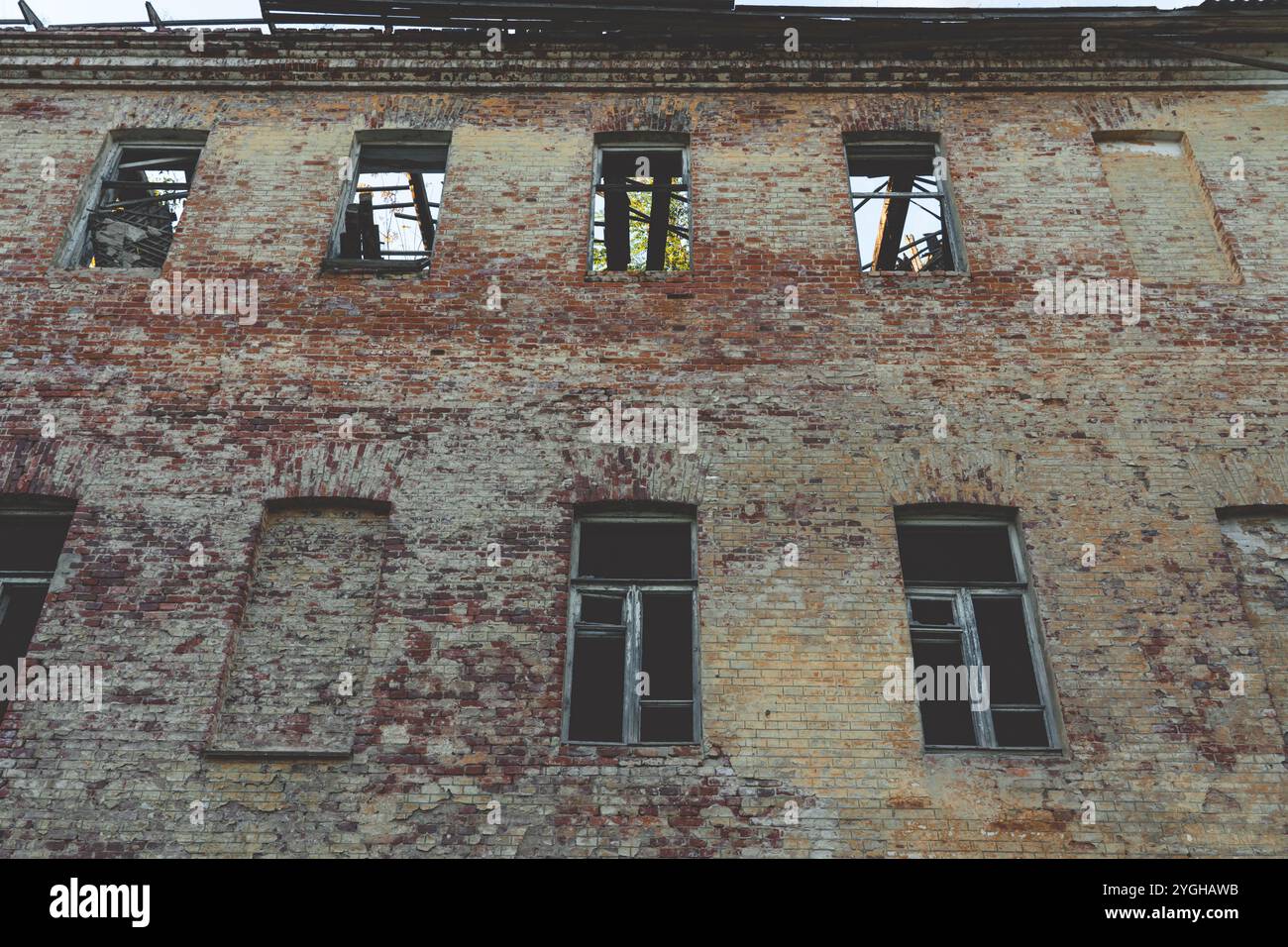 An abandoned building with no windows. An old abandoned, forgotten ...