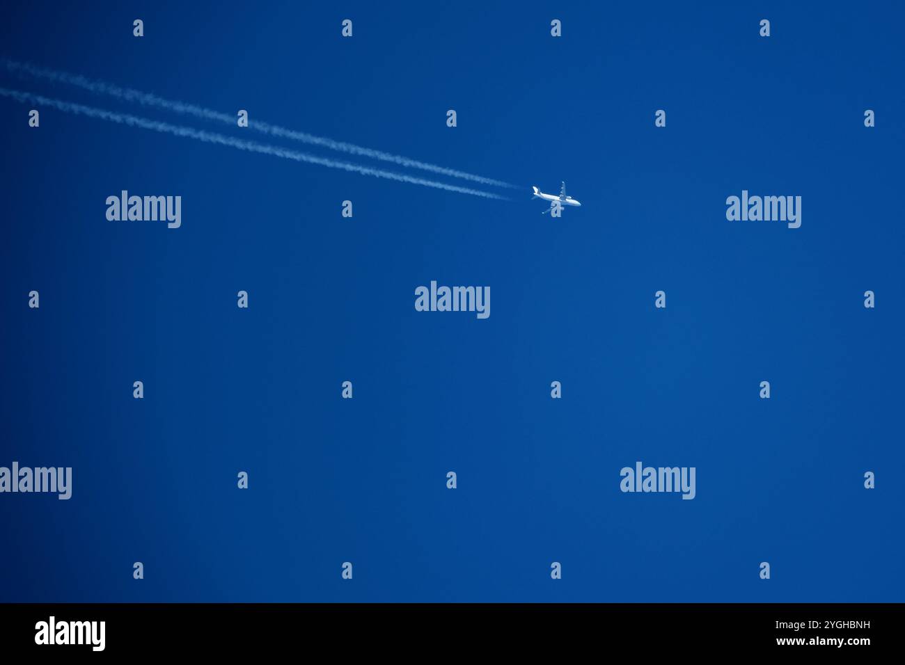 Airplane jet contrail in hi-res stock photography and images - Alamy