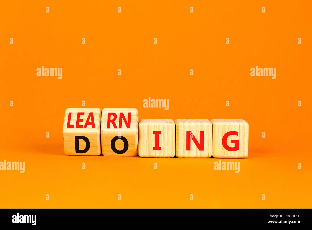 Doing or learning symbol. Turned wooden cubes and changed the word ...