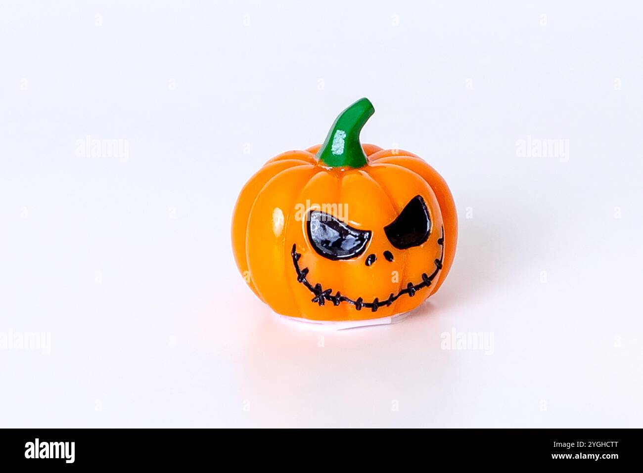 Spooky halloween pumpkin with scary face on white background Stock ...