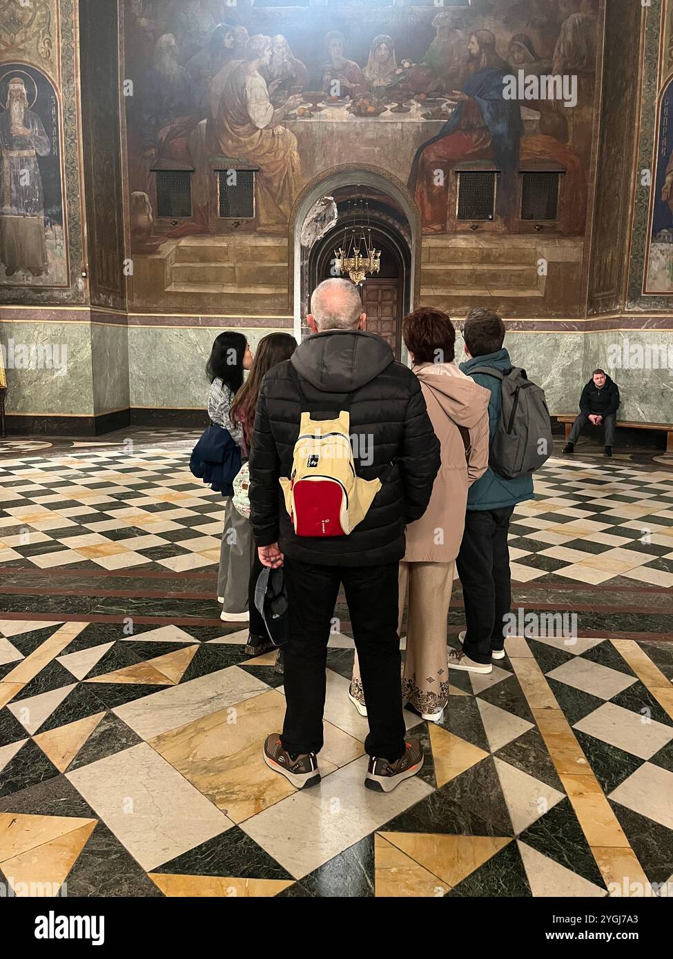 Tourists visitors in the St. Alexander Nevsky Patriarchal Orthodox Cathedral interior in Sofia Bulgaria, Eastern Europe, Balkans, EU - Smartphone Captured Stock Image