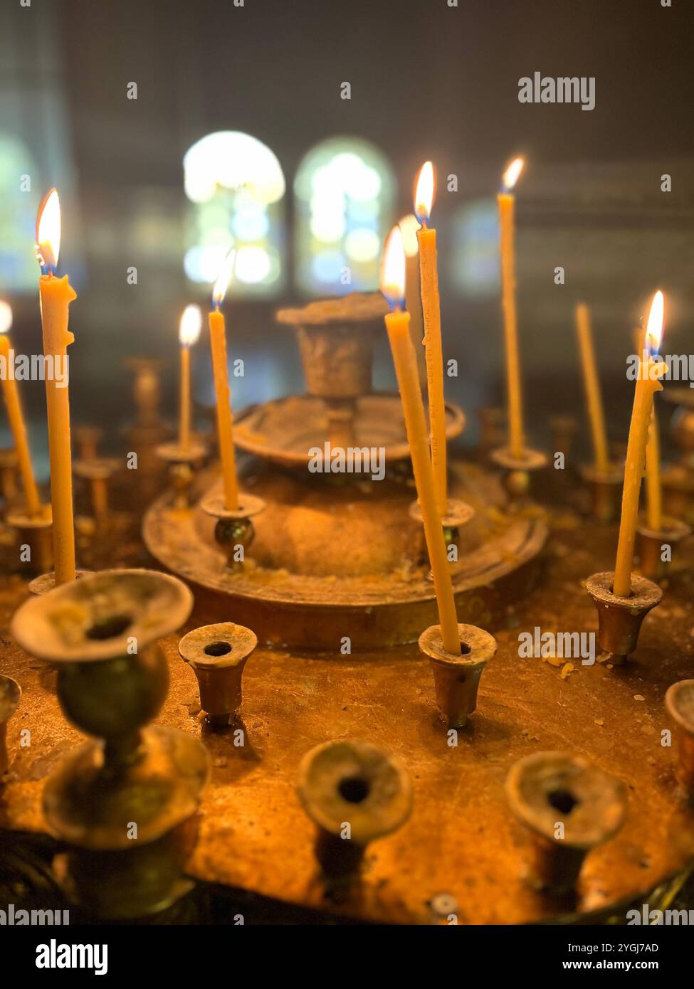Orthodox church burning candles on a stand in St. Alexander Nevsky Patriarchal Cathedral interior in Sofia Bulgaria, Eastern Europe, Balkans, EU - Smartphone Captured Stock Image
