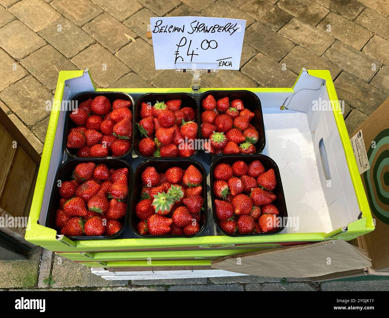 Punnets of Belgian strawberries for sale at market - Smartphone Captured Stock Image
