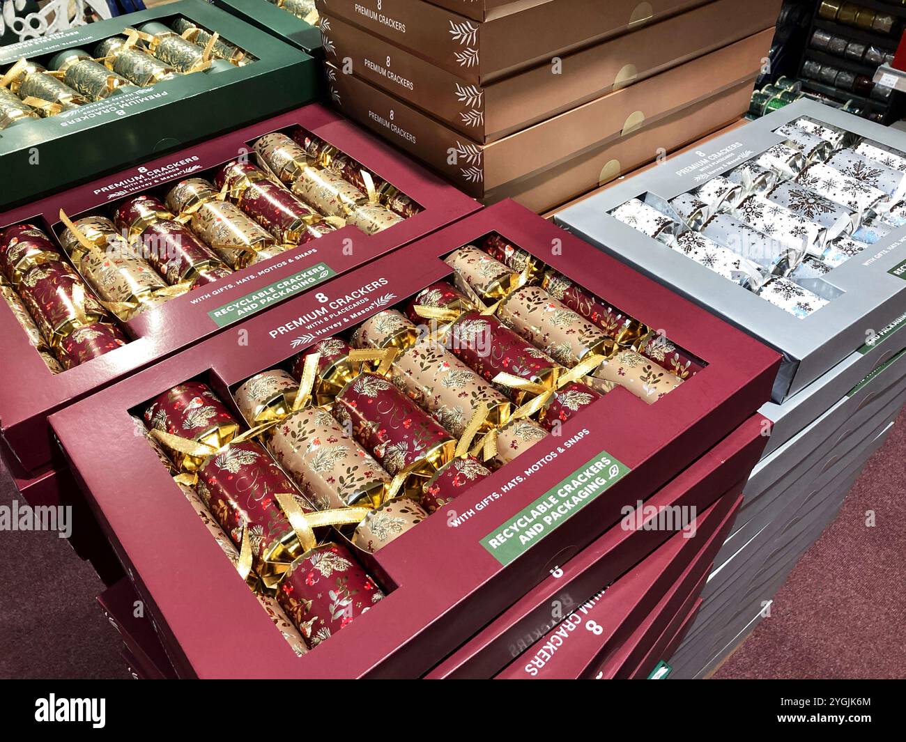 Selection of Christmas Cracker boxes for sale at local store - Smartphone Captured Stock Image